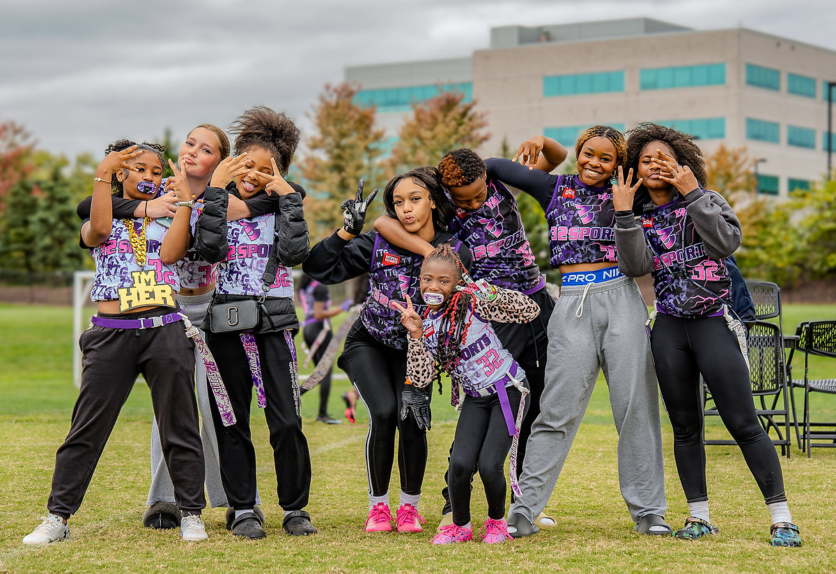 Maryland flag football teammates celebrating